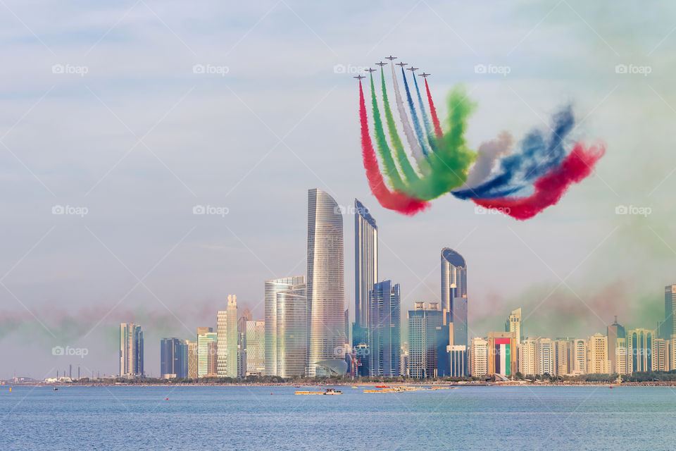 Al Fursan aerobatic team performing their tricks in the sky in Abu Dhabi