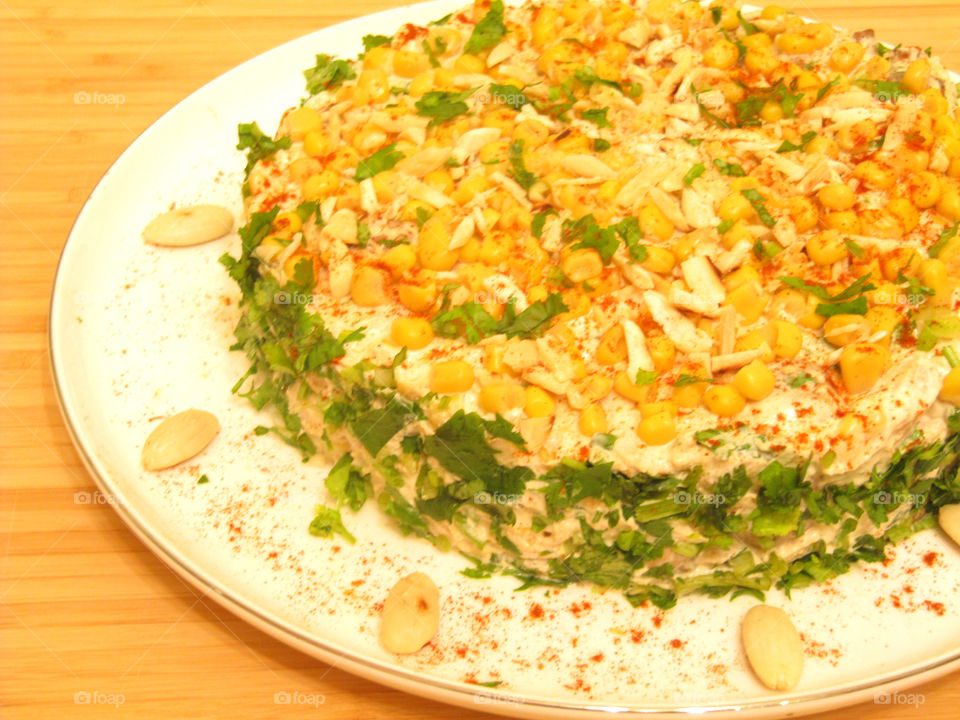 Salad Tiffany with almonds and corn