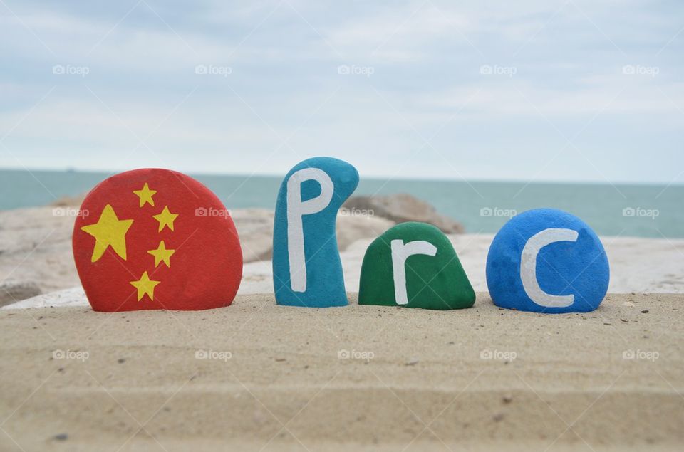 PRC with national flag on colored stones