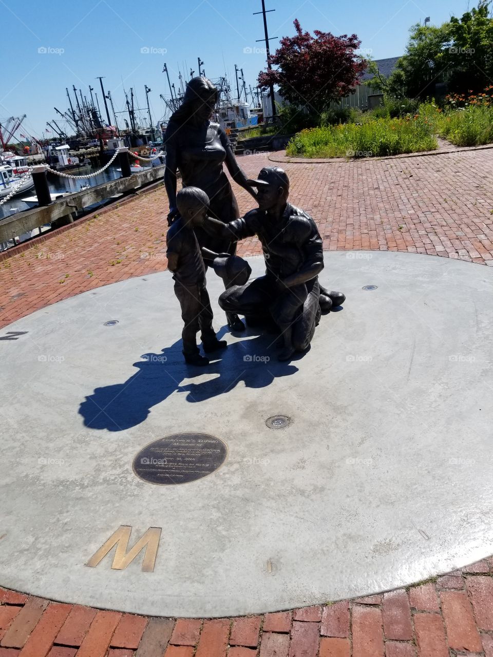 A fisherman saying goodbye to his family monument New Bedford Massachusetts