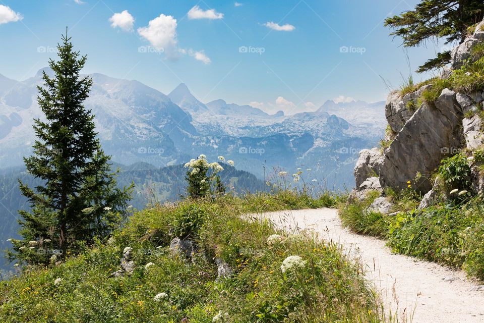 Hiking trail on mountain Jenner in beautiful Berchtesgaden with stunning view of mountain peaks in Austria and Germany 