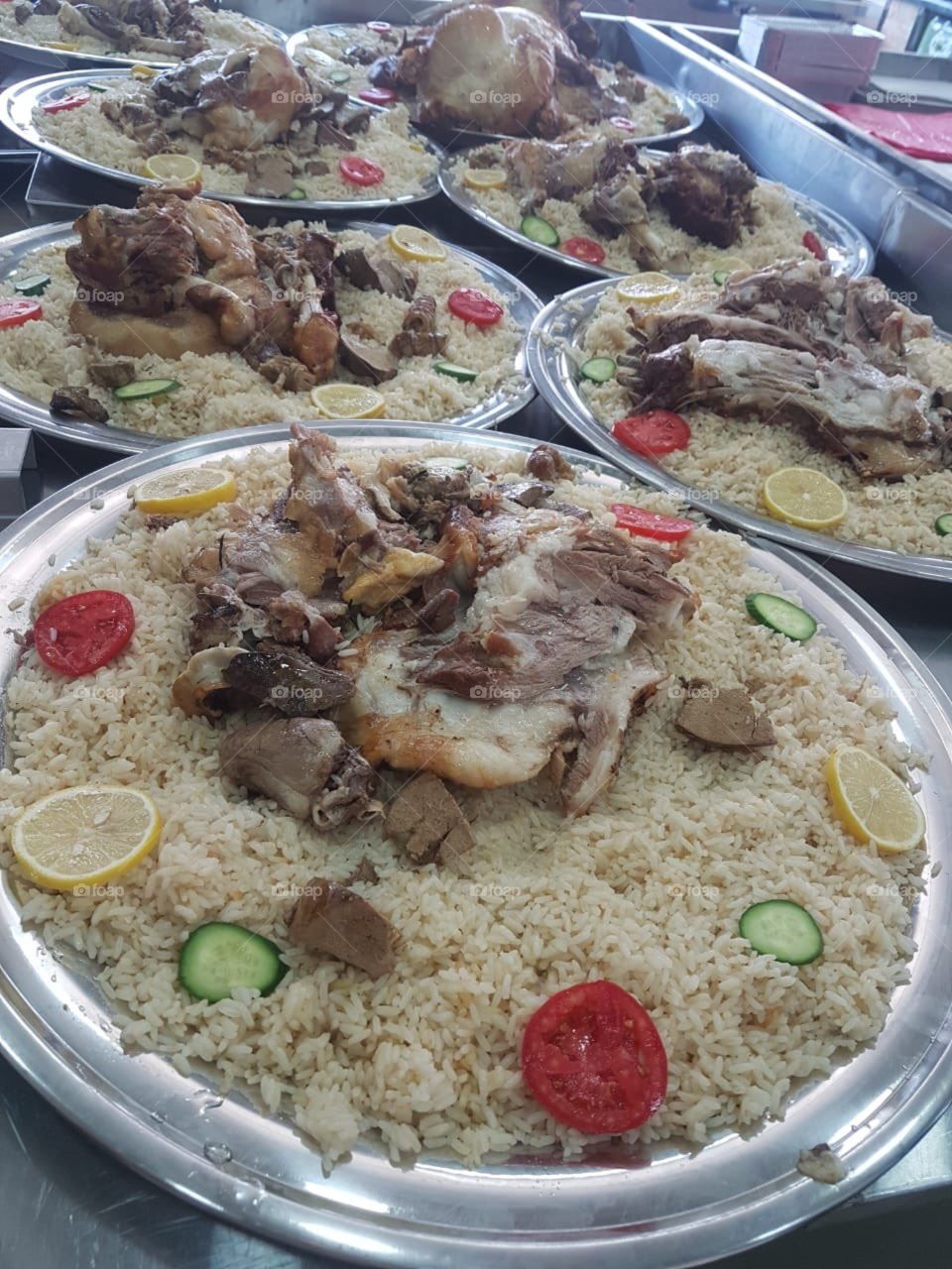 Laham Mandi or Lamb Mandi is a Saudi Arabian Traditional dish which is also very popular in other middle eastern countries like United Arab Emirates, Qatar, Kuwait, Oman and yemen. Rice made with special spices while lamb gets Roasted under the Soil.