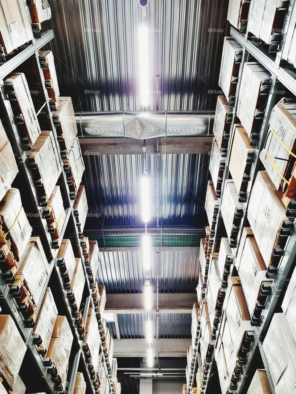 Industrial warehouse corridor photographed from below