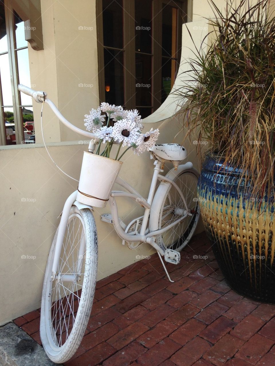 White bicycle with flowers