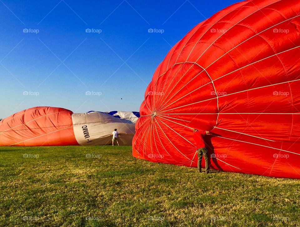 Red Color Story. Preparing balloons to fly.