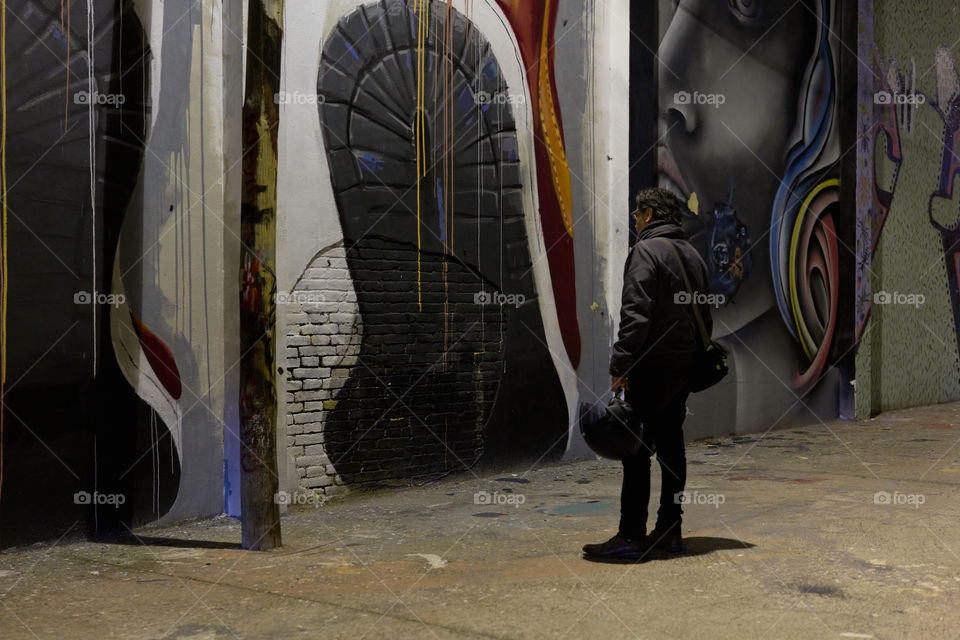 Night lights over a Graffiti Wall