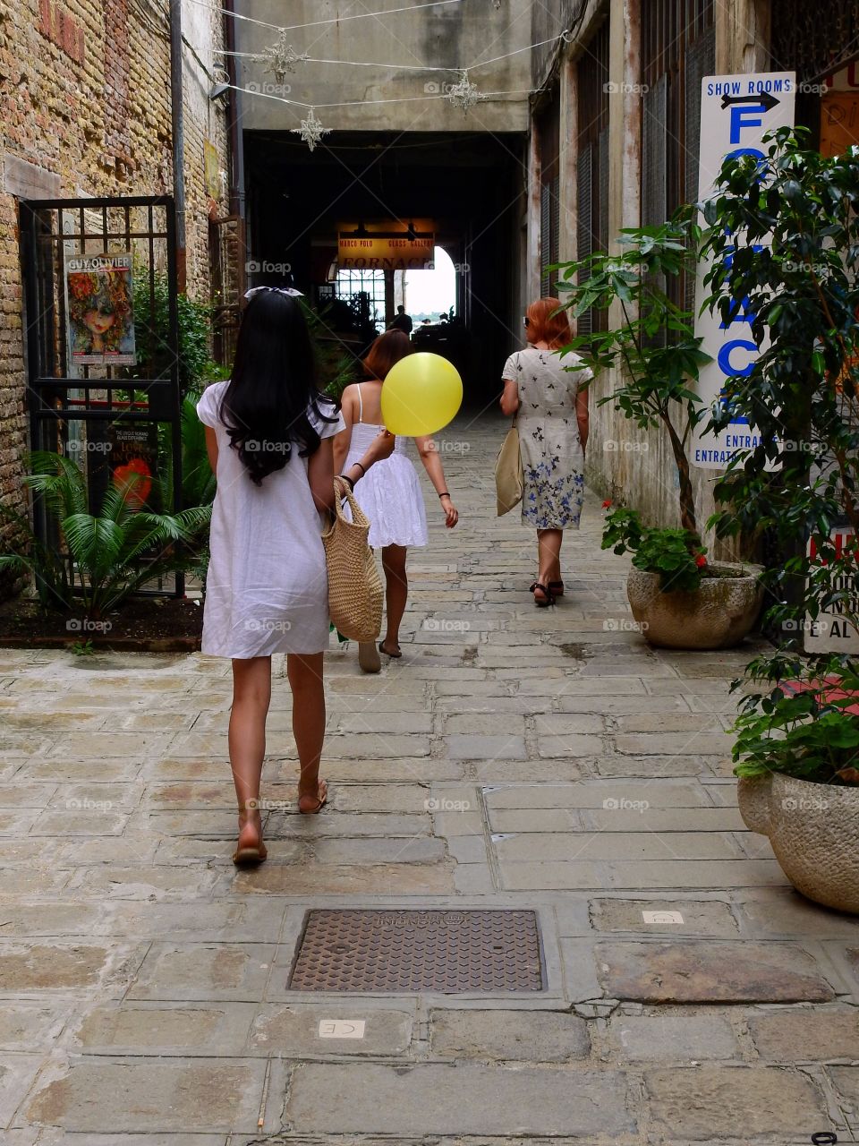 Girl with yellow balloon