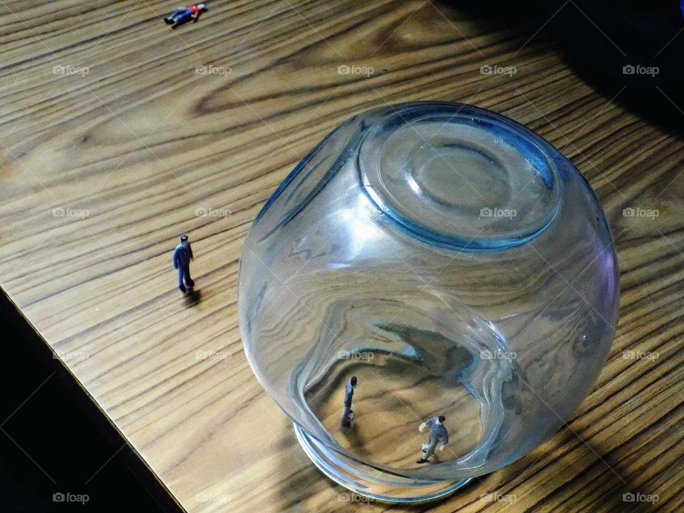 From the world of liliput, trapped in a glass jar, mister giant