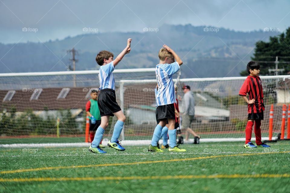 Young Boys Playing Soccer