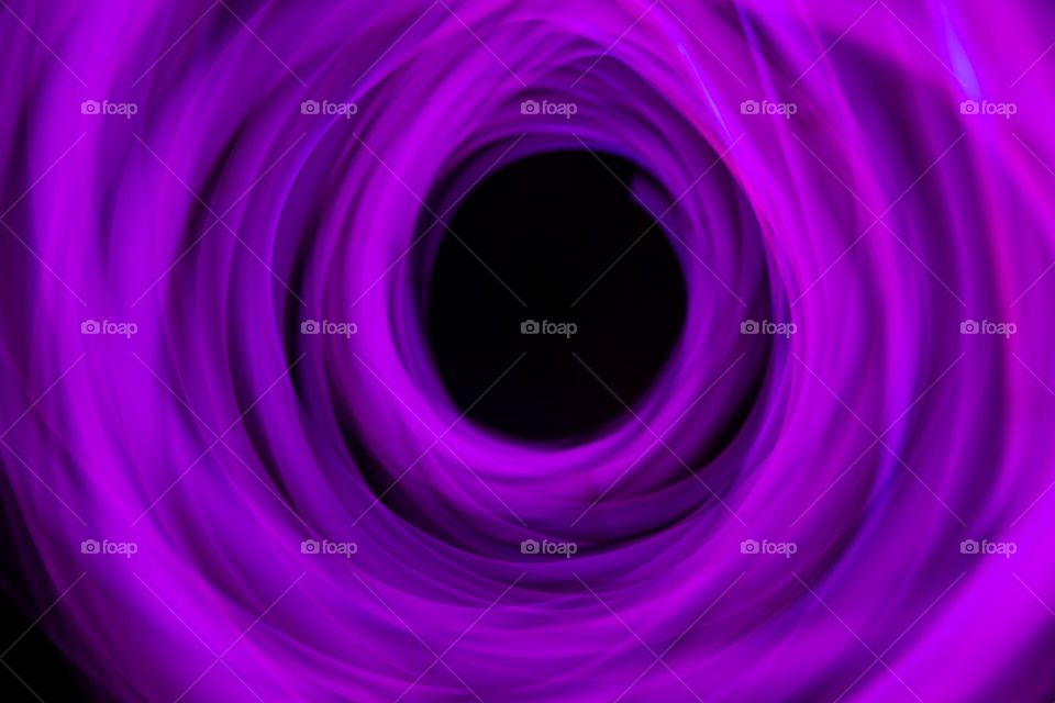 Abstract motion purple circular background, created with slow shutter speed