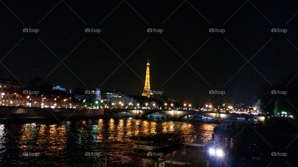 Midnight  at the Eiffel Tower . Taken while vacationing in Paris, March 2014