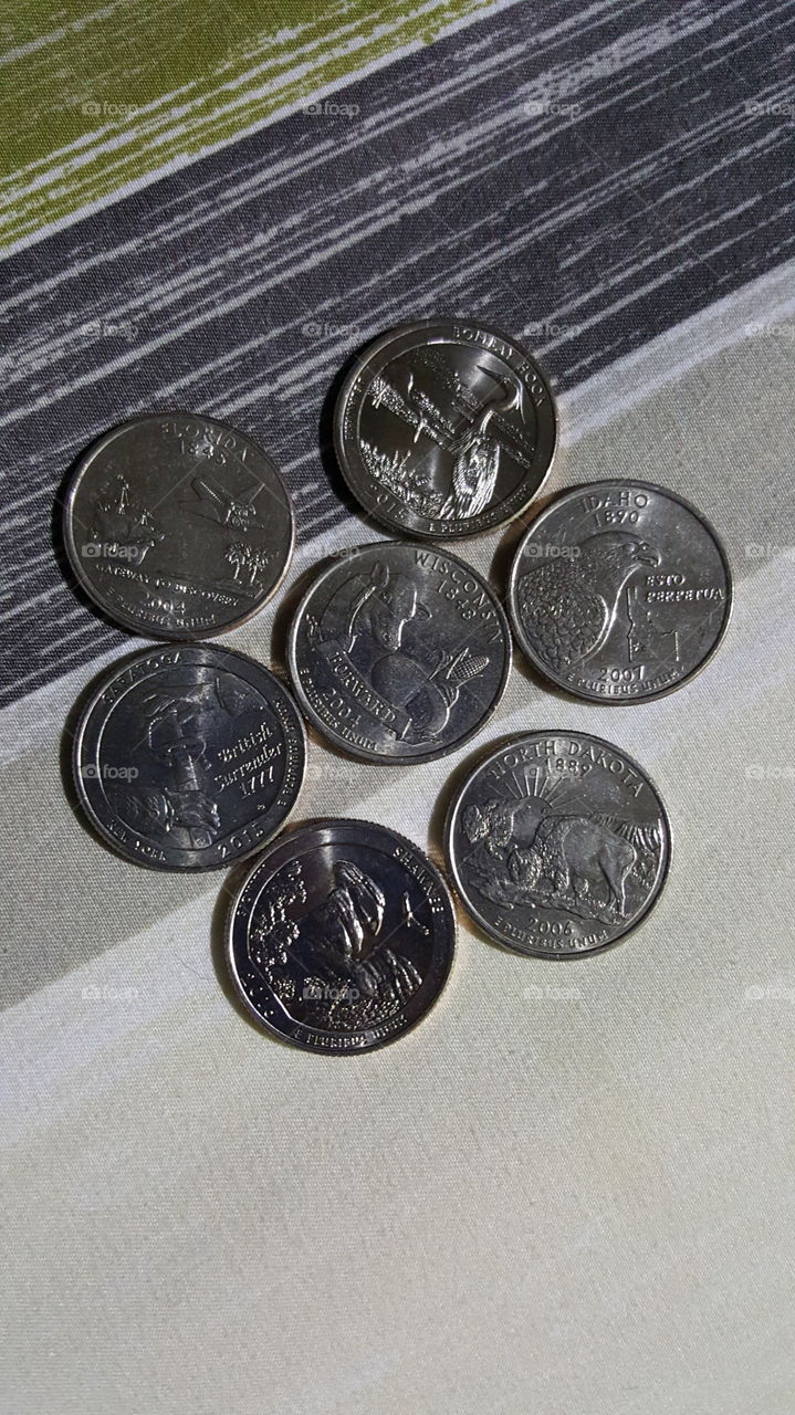 A group of quarters circled around another. I had to give these away after I took the picture.