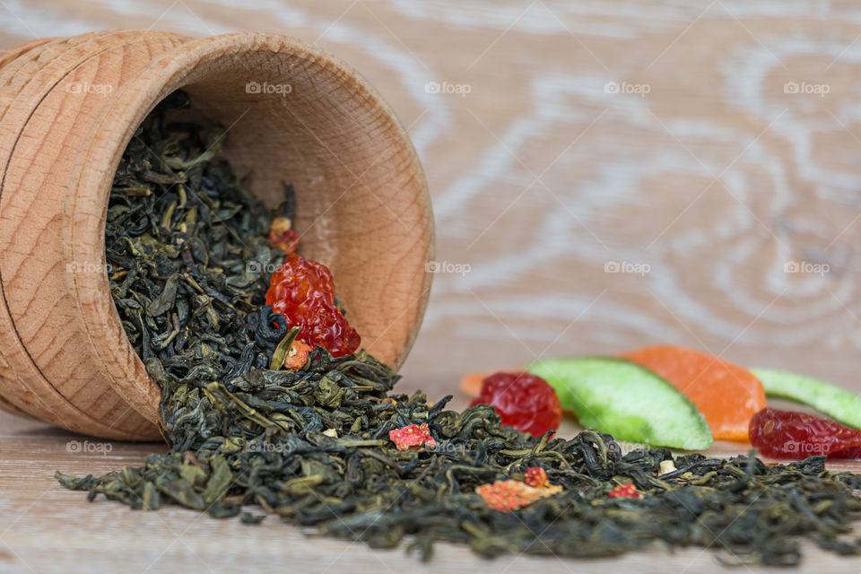 Spilled tea herbs with dried fruit