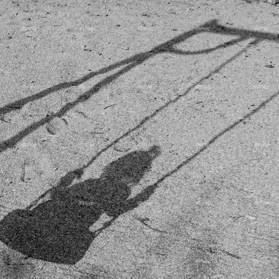 Shadow on a swing