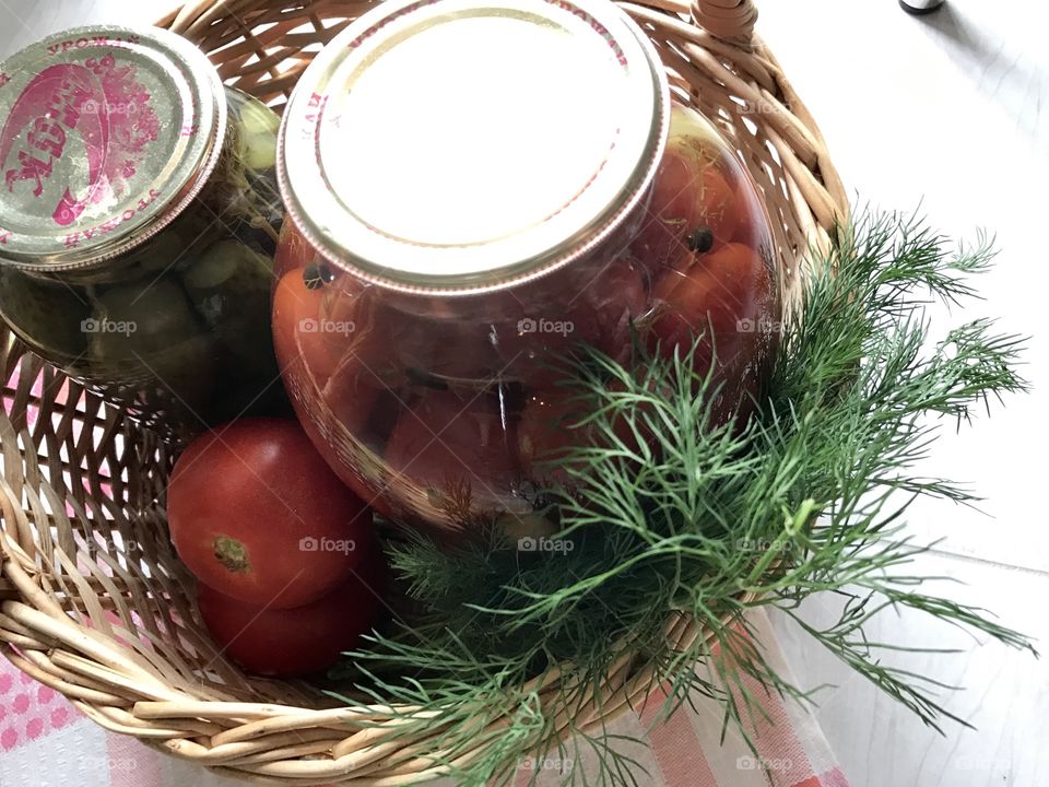 homemade pickles cucumbers and tomatoes 