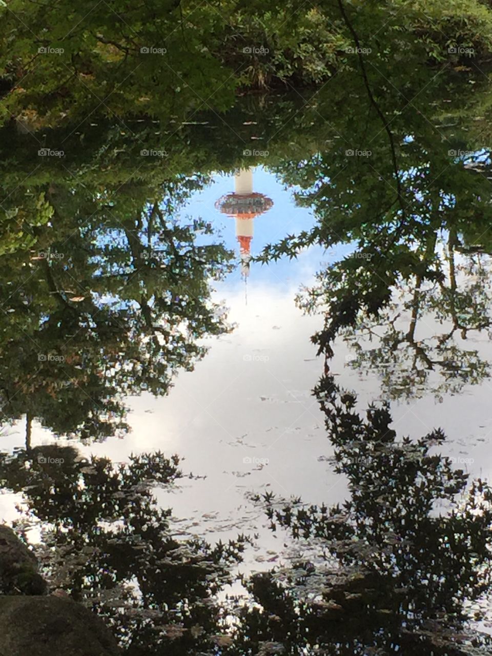 Reflection of the Kyoto Tower, then in Kyoto, Japan