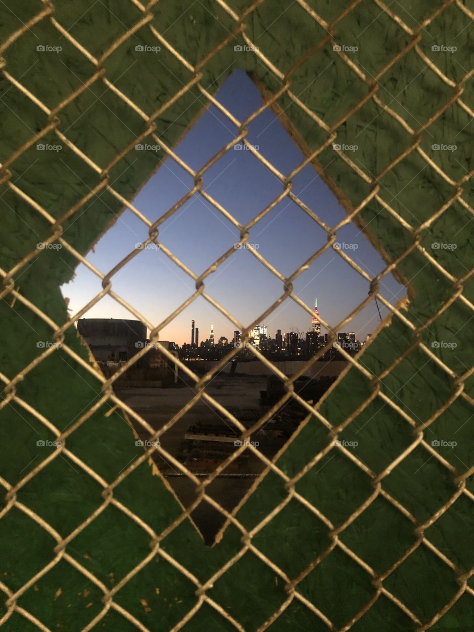 New York through a chain link fence 