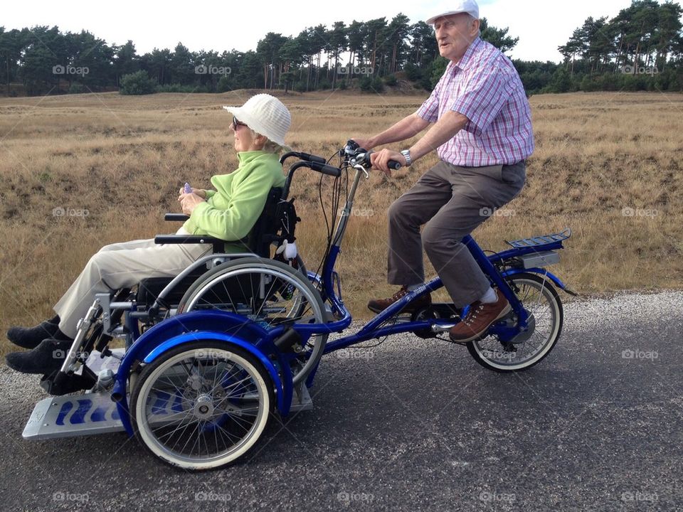 Grandma and Grandpa on the wheelchair bicycle