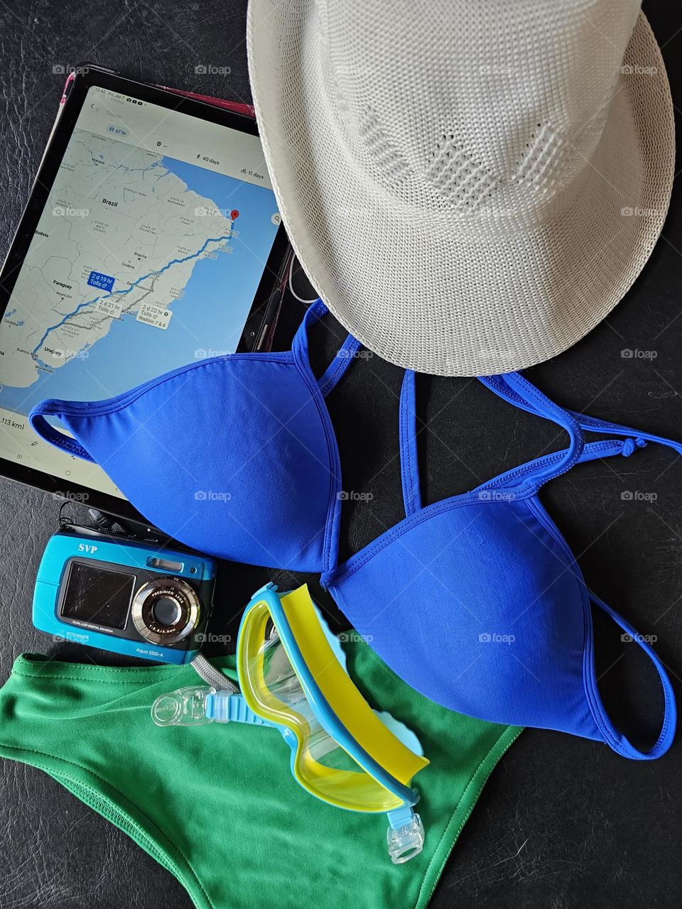 Photo camera, GPS, goggles, hat, swim wear