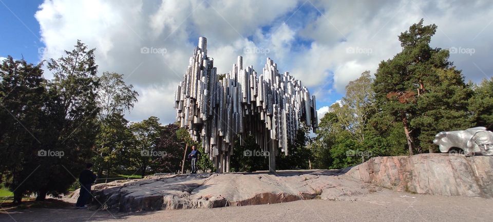 Sibelius monument in Helsinki with a beautiful cloudy sky