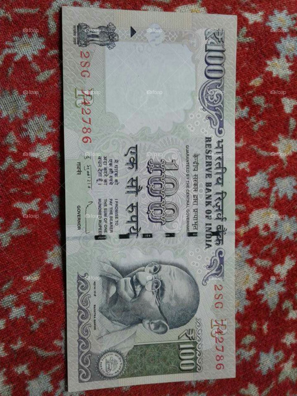 100 rupees note number 786