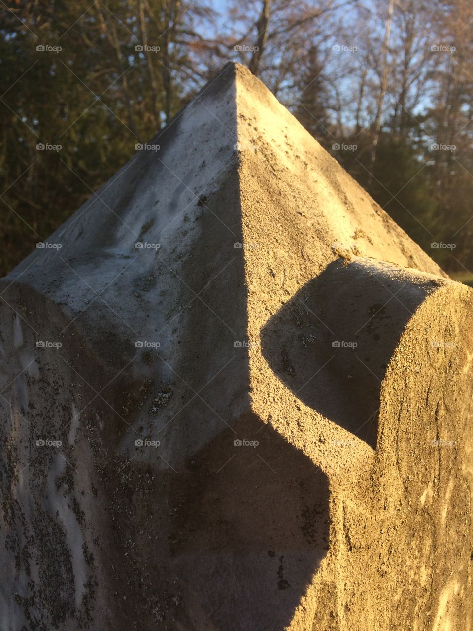Top of a old stone grave marker 