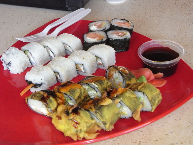 Sushi on a red plate