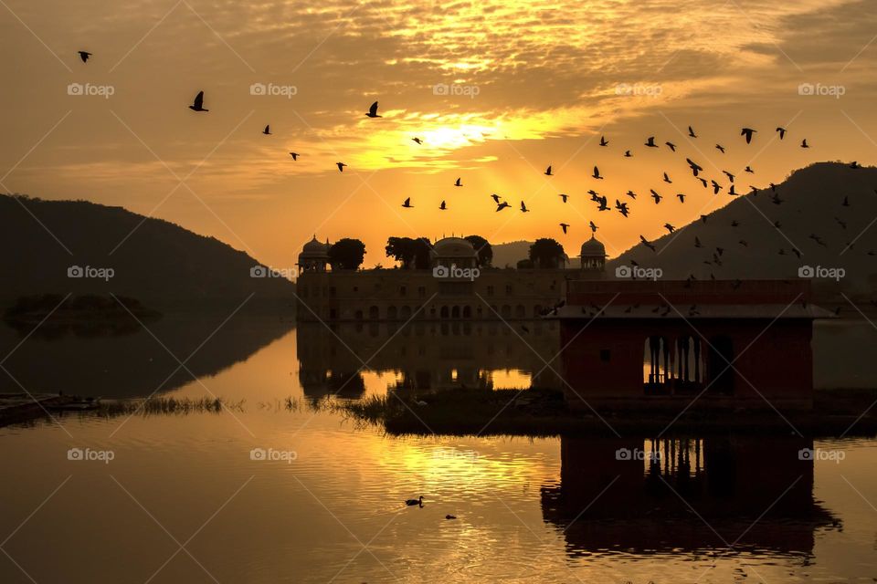 Jal mahal palace at silhouette morning 