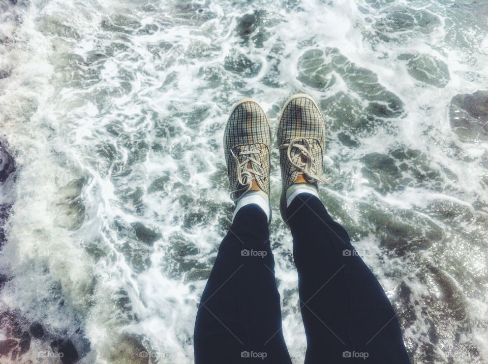 Feet POV above the storm 