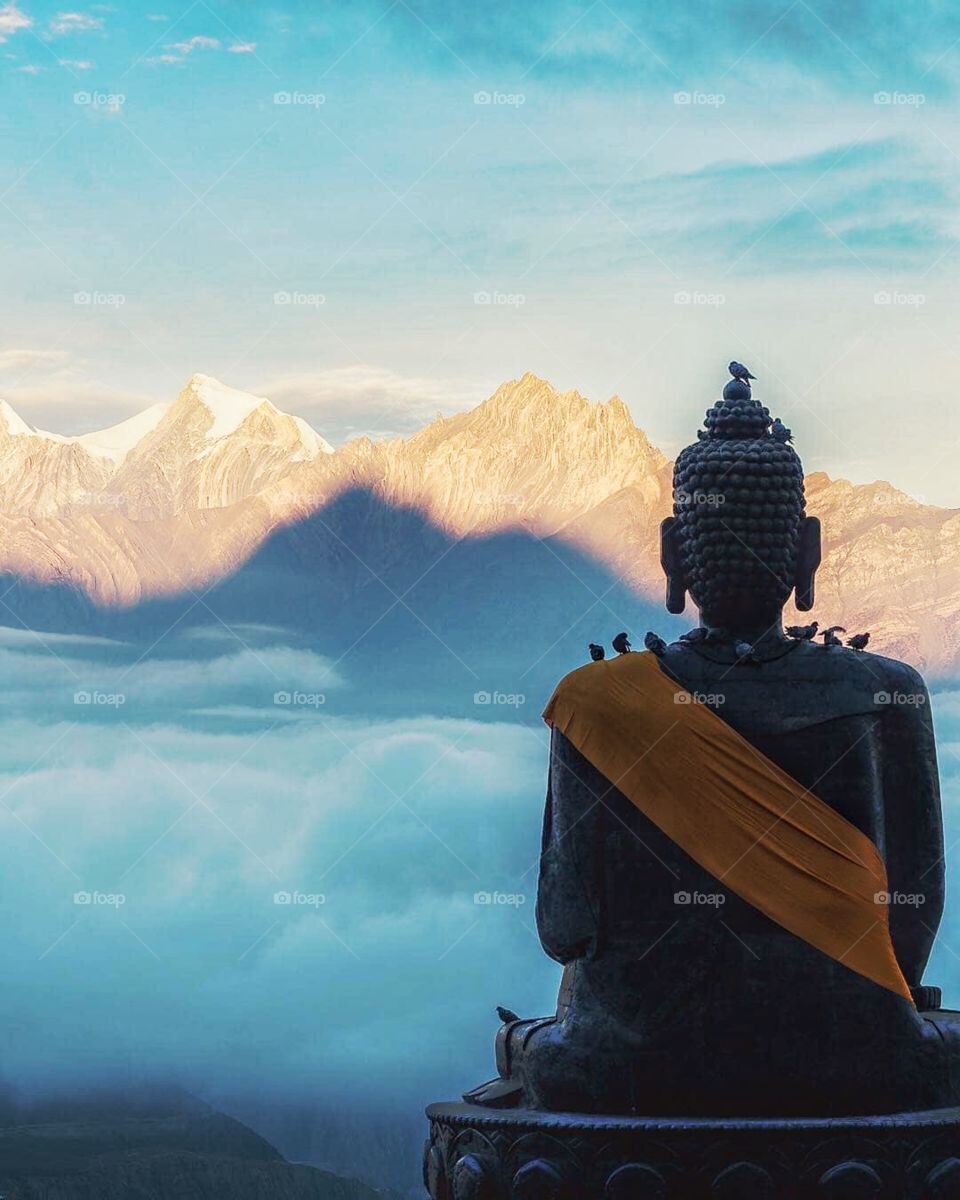 Hi I’m new to Foap. I do love photography though. I think this one right here is one of my favorite photos. It’s a 32 feet stone statue of Buddha overlooking the awe-inspiring Himalayan ranges. Just looking at this photo gives me a sense of peace.
