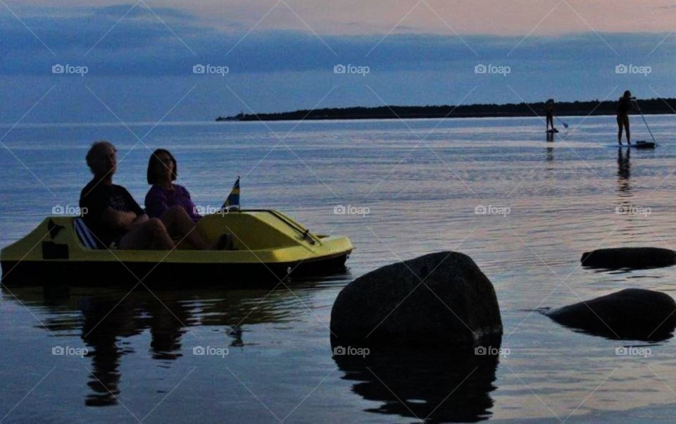 Paddle boat on still water