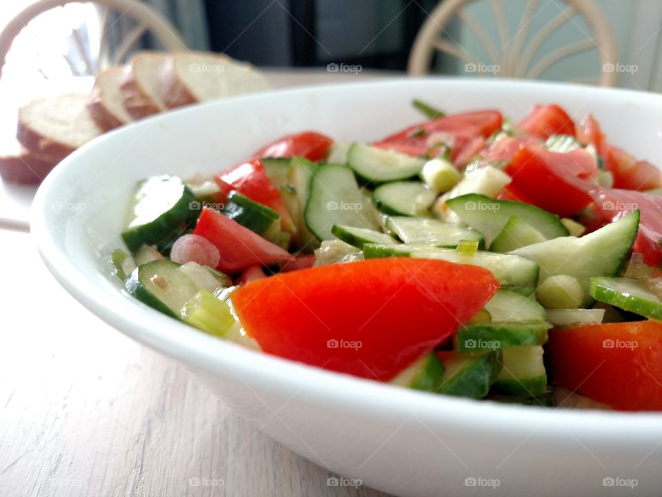 Summer salad with bread.