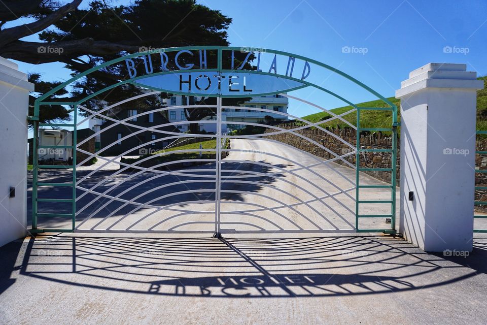 Shadows formed from a reflection of a 1930’s Art Deco entrance gate 