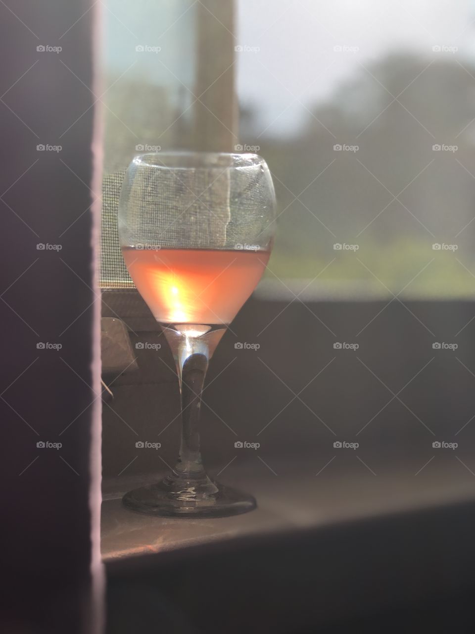 Wine glass in window 
