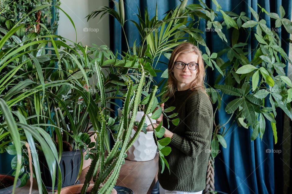 woman caring about plants