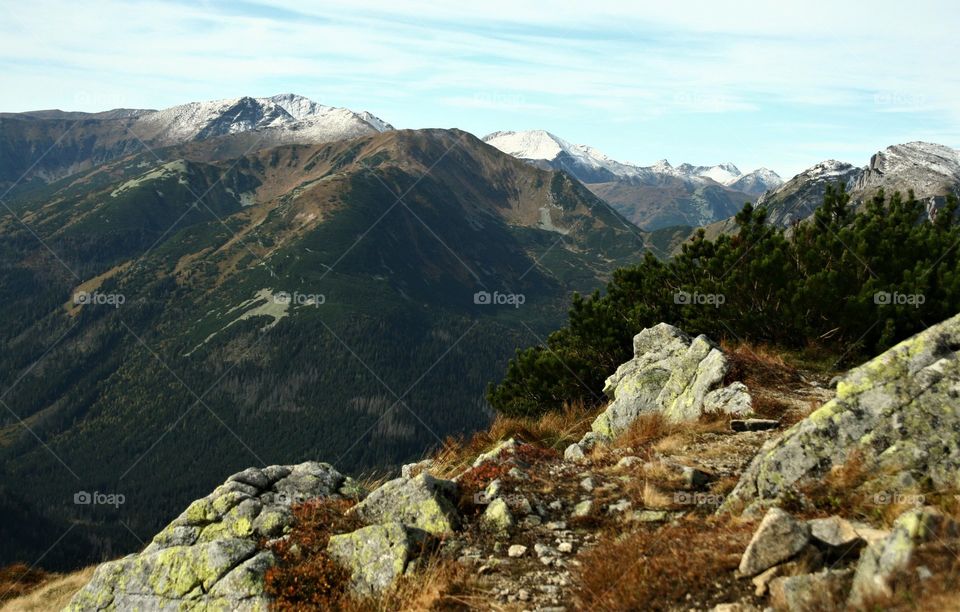 Awesome mountain panorama on the trail in autumn