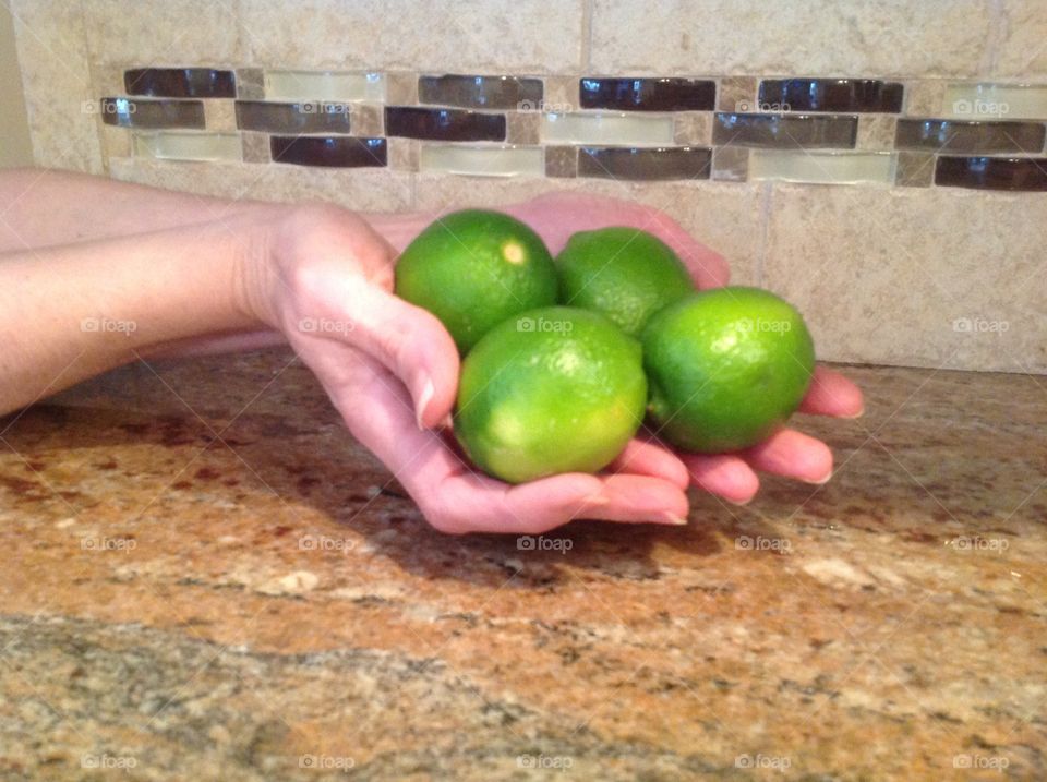 A handful of delicious limes.