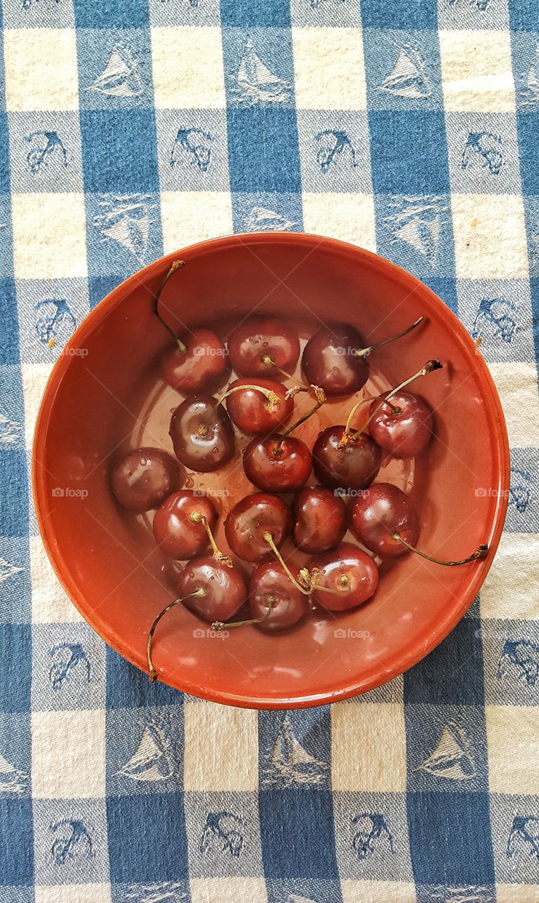 High angle view of cherries in bowl