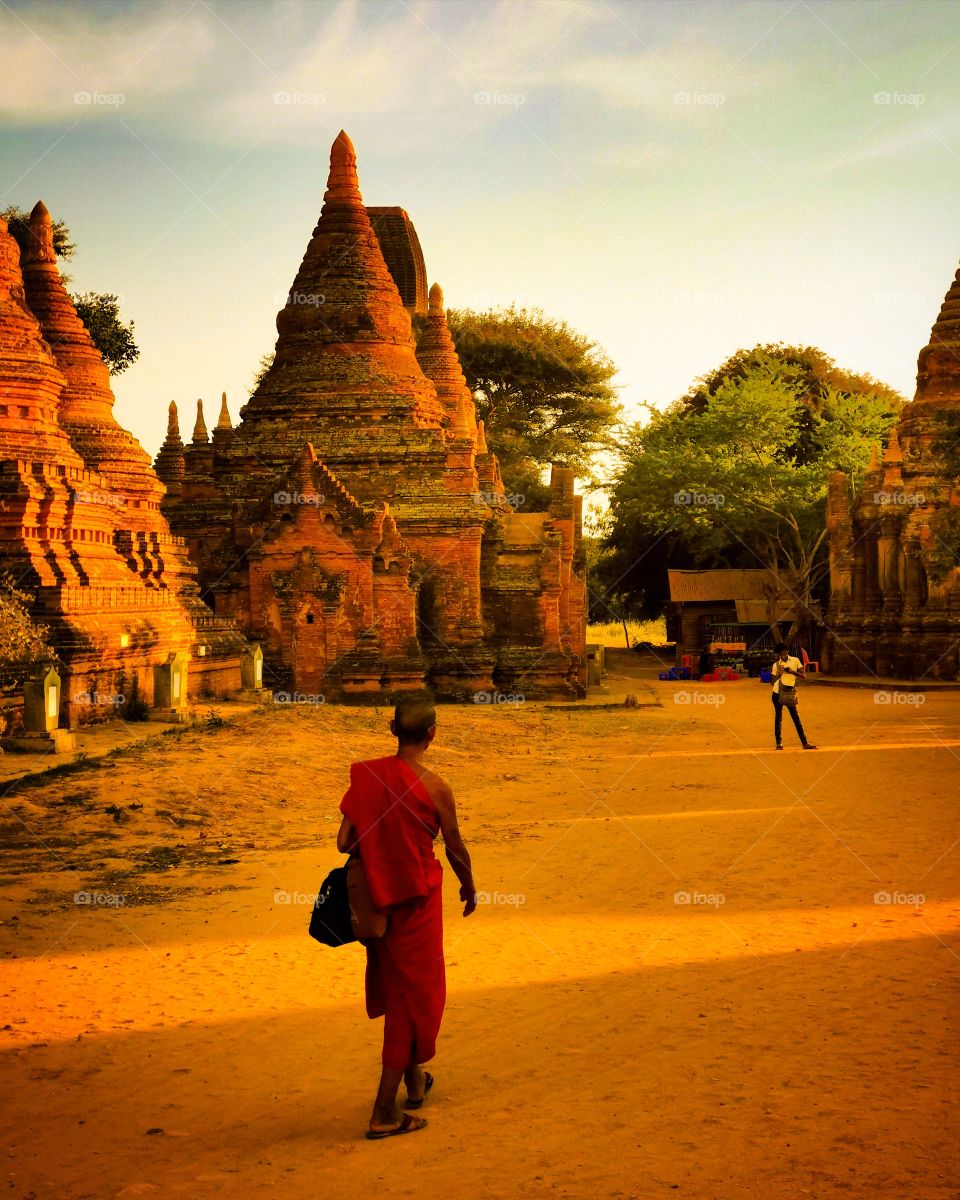 A monk walks through the temples of Bagan, Myanmar.