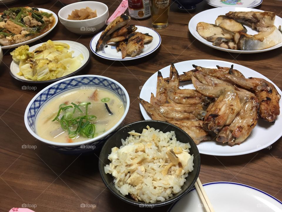 Sake-less soup with whale, fried rice with fish, Napa cabbage with soy sauce, grilled fish, chicken wings, and sauteed vegetables