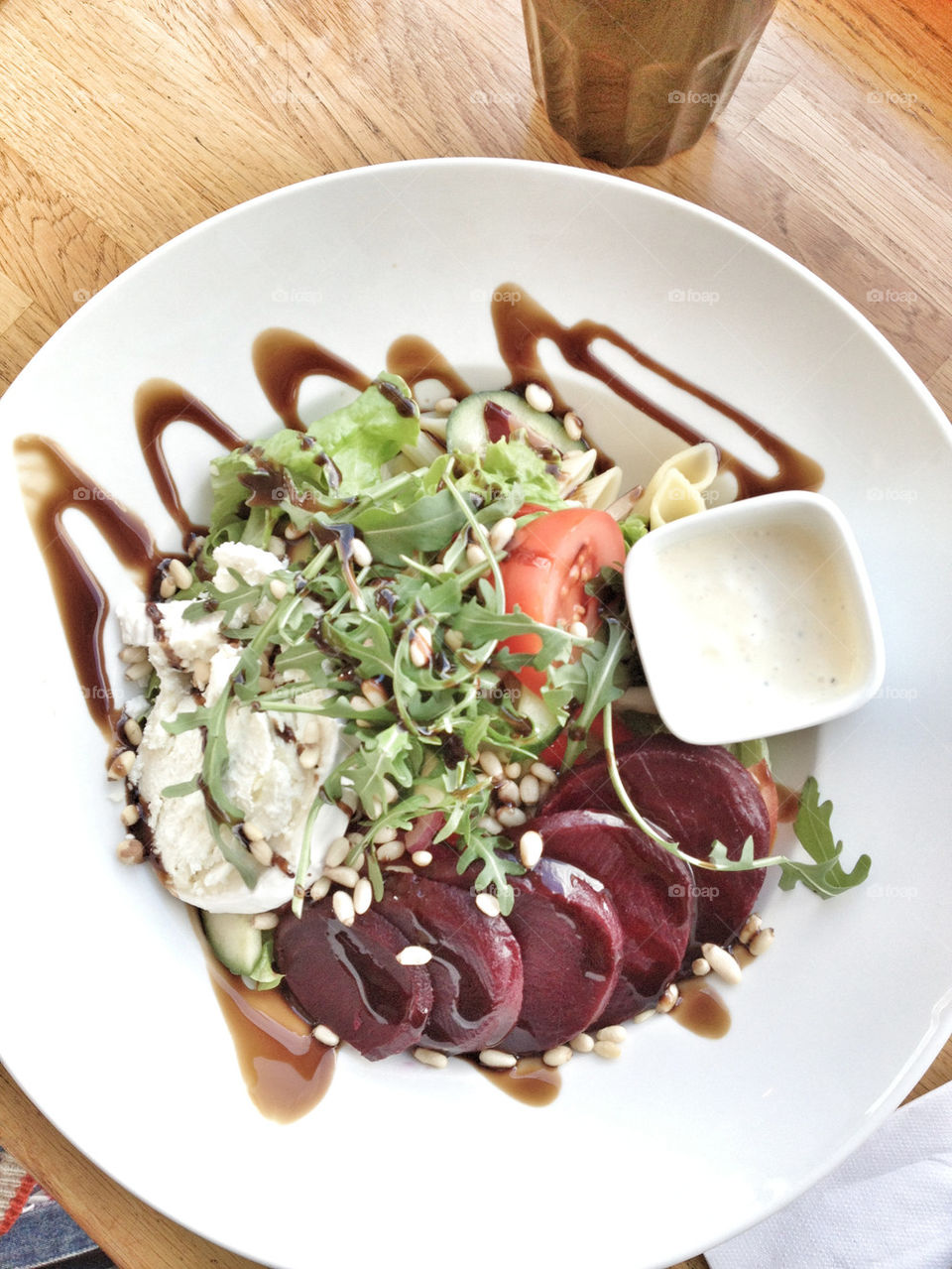 chèvre and beetroot salad with pinenuts