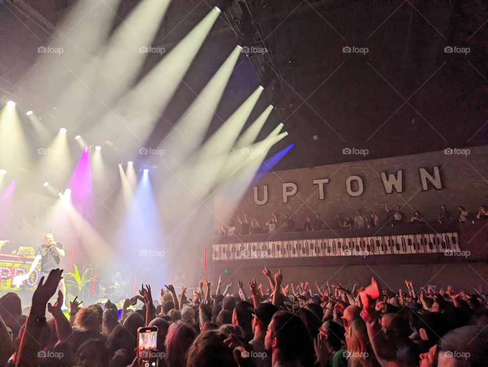 local hip hop concert crowd at the uptown theater in Minneapolis MN spotlights, balcony crowd, crowd cheering, live music show