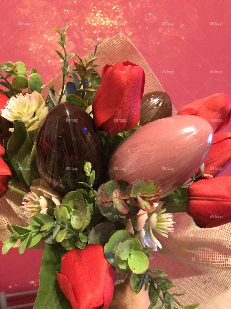 bouquet of flowers decorated with Easter chocolate eggs, Easter decorations