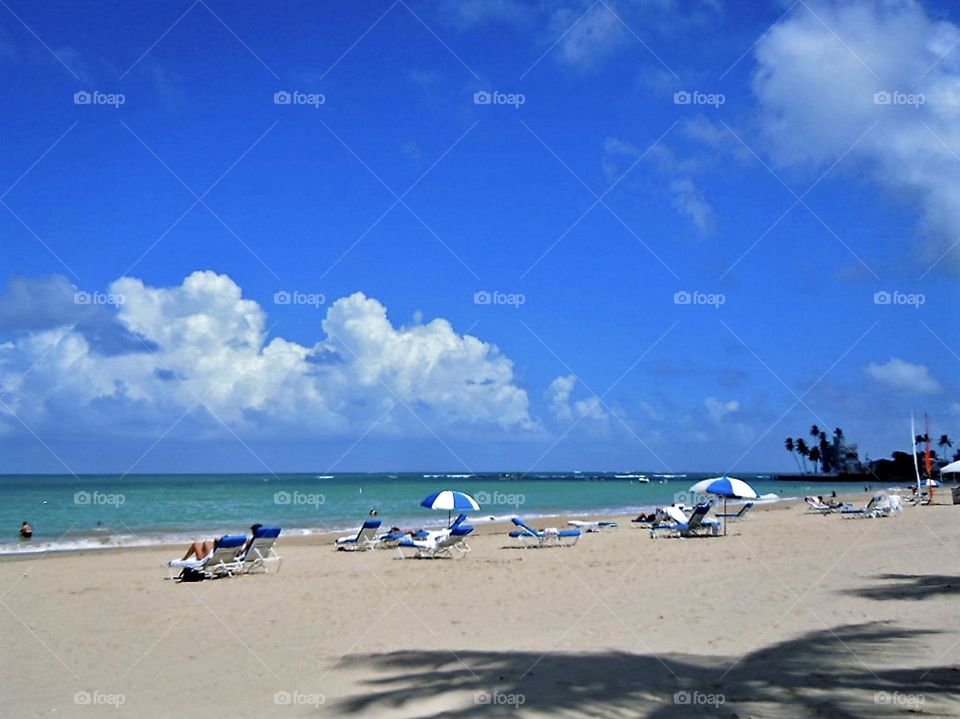 The beach is a summertime destination for fun and relaxation. 