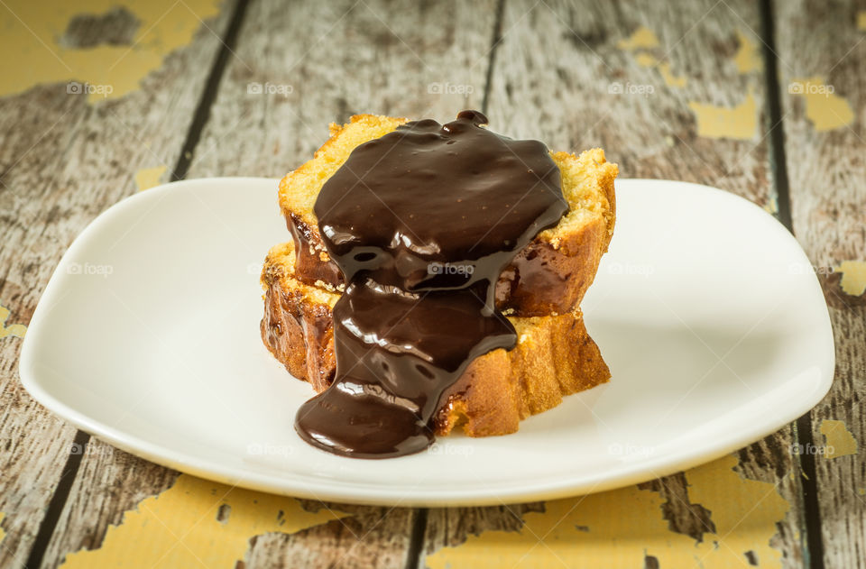 Hot chocolate on a slice of cake