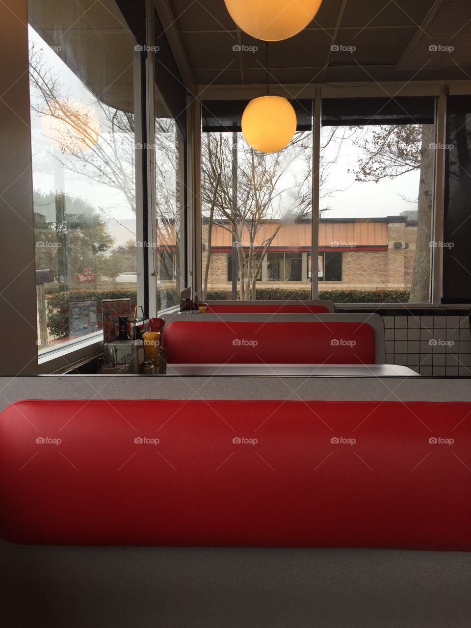 Red booths in a fast food restaurant