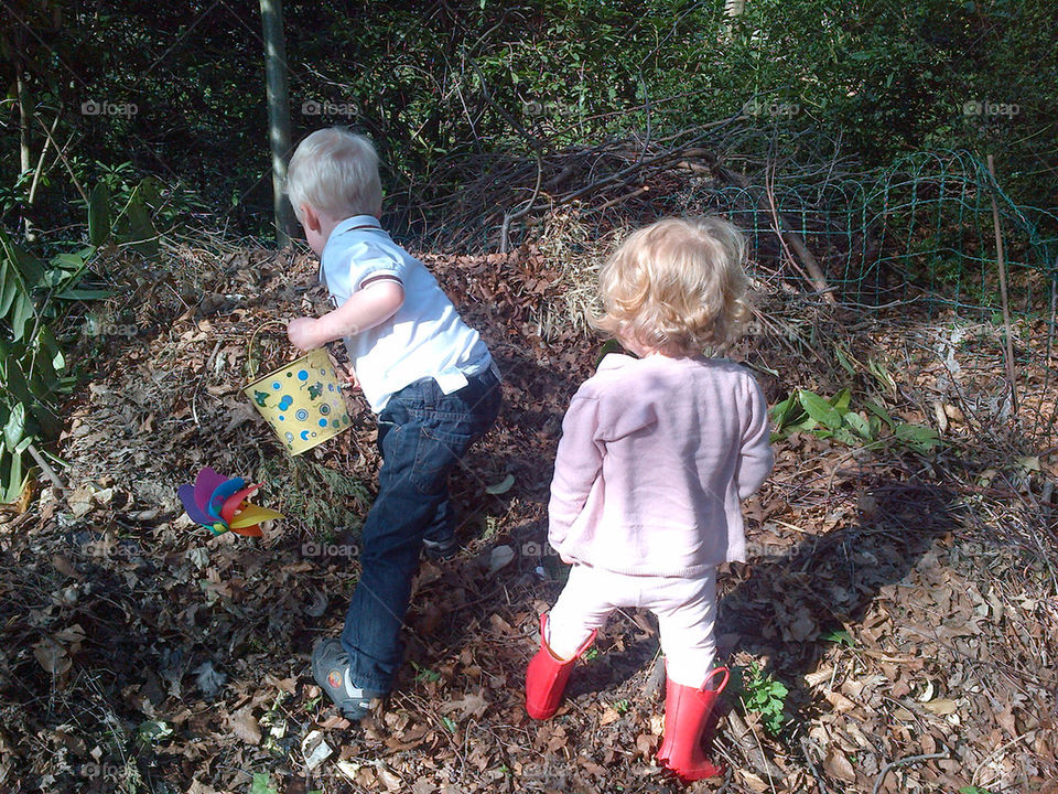 Working hard on the compost heap in the garden.