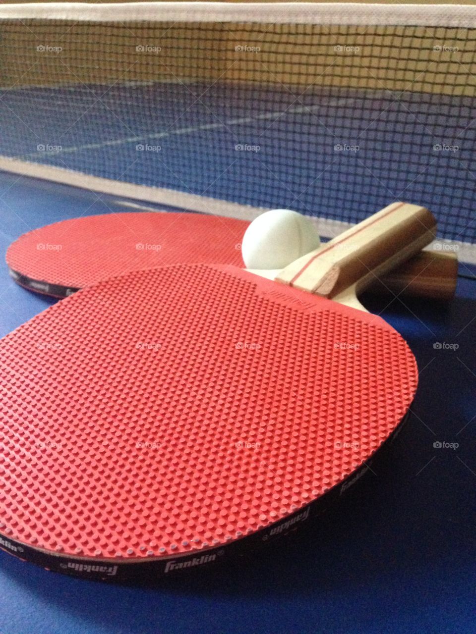 Ping pong, anyone?. Ping pong table and paddles