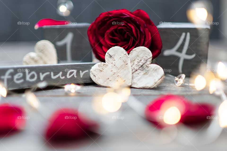 date of valentines day, hearts and a red rose