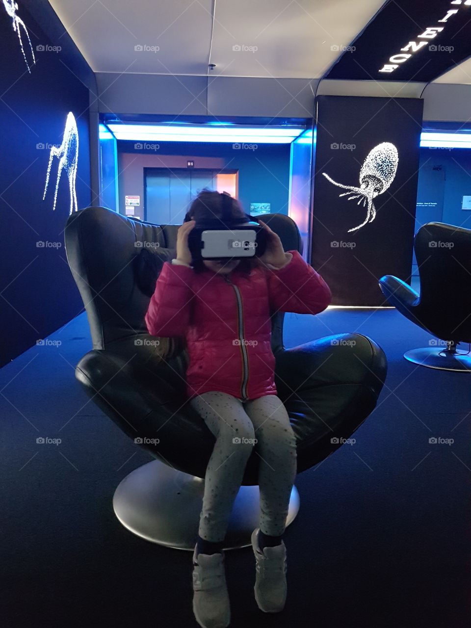 Girl enjoying a virtual reality experience